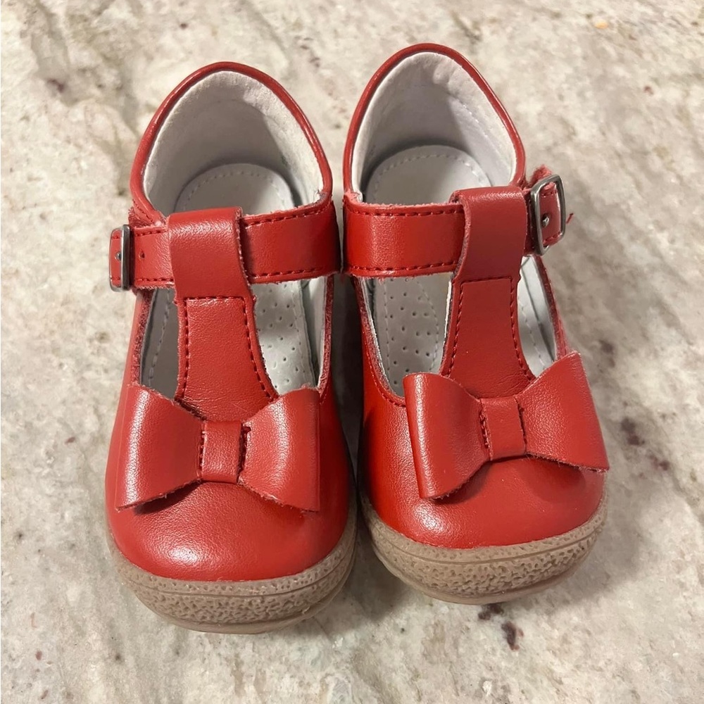 Red Lamour’s with bows on toe